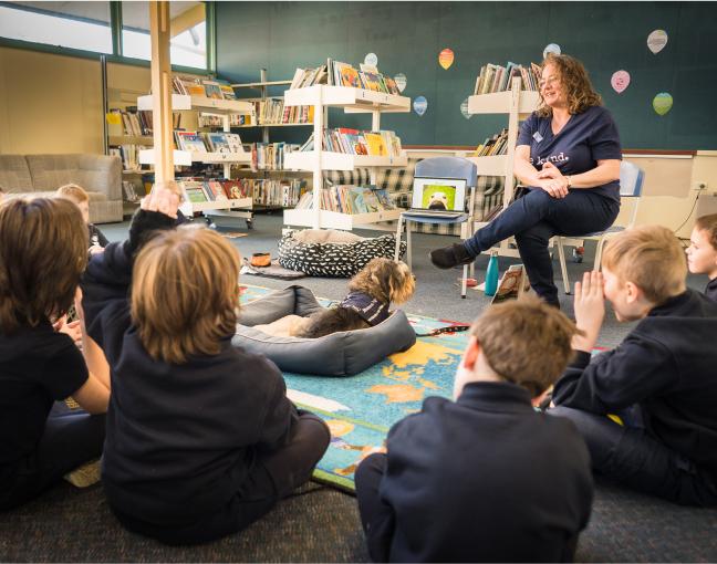 Classroom setting with dog